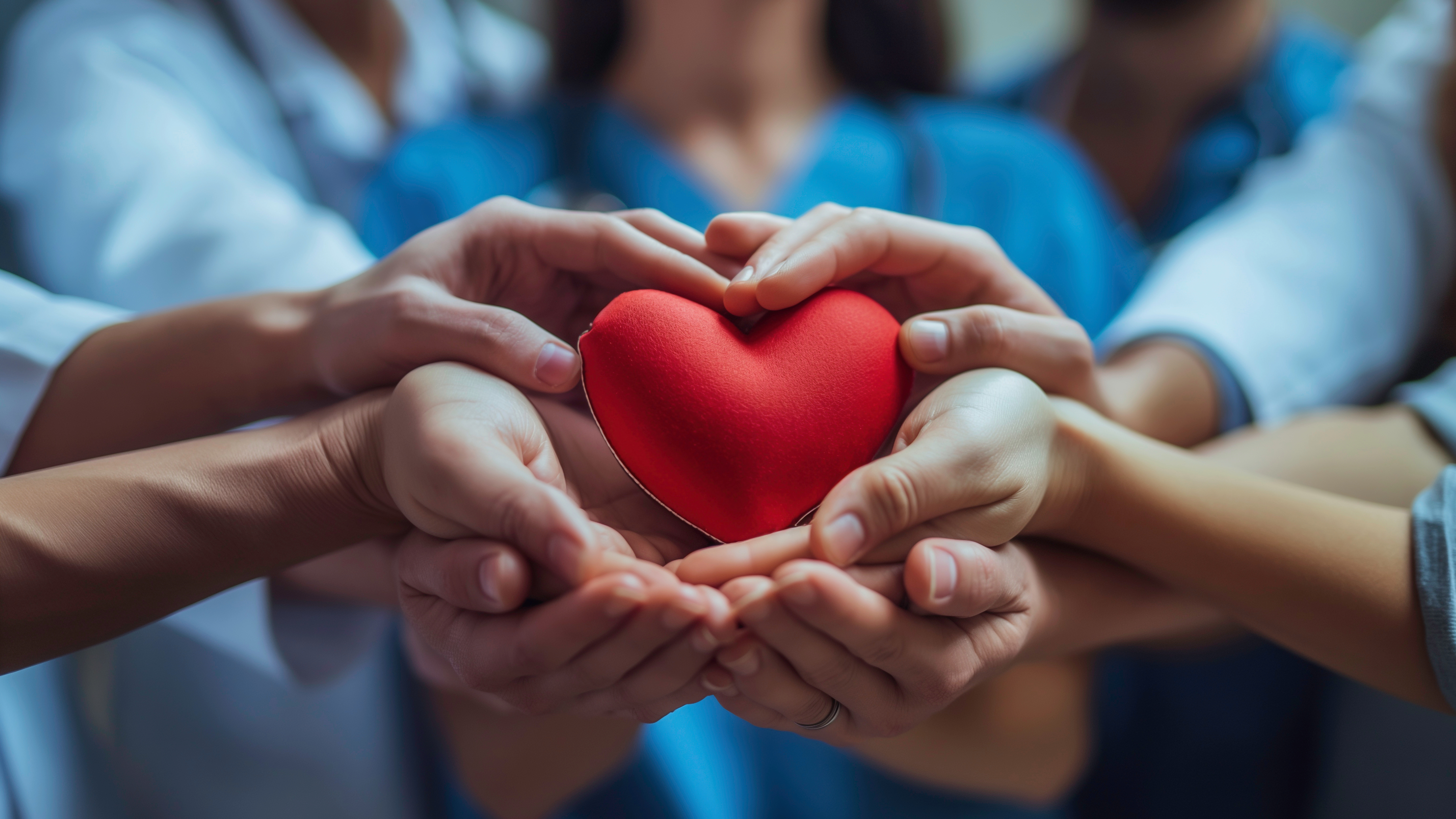 Rum River Counseling team with hands together